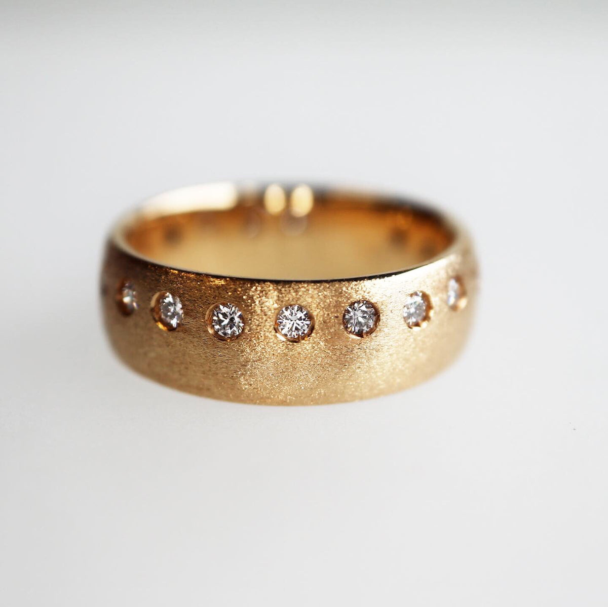 Offset Diamond Band in Textured Gold – Diamond Gallery